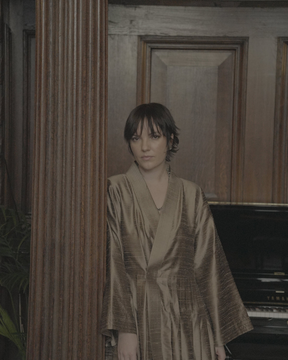 Yana Mann, founder and creative director of AYE, wearing an AYE design.